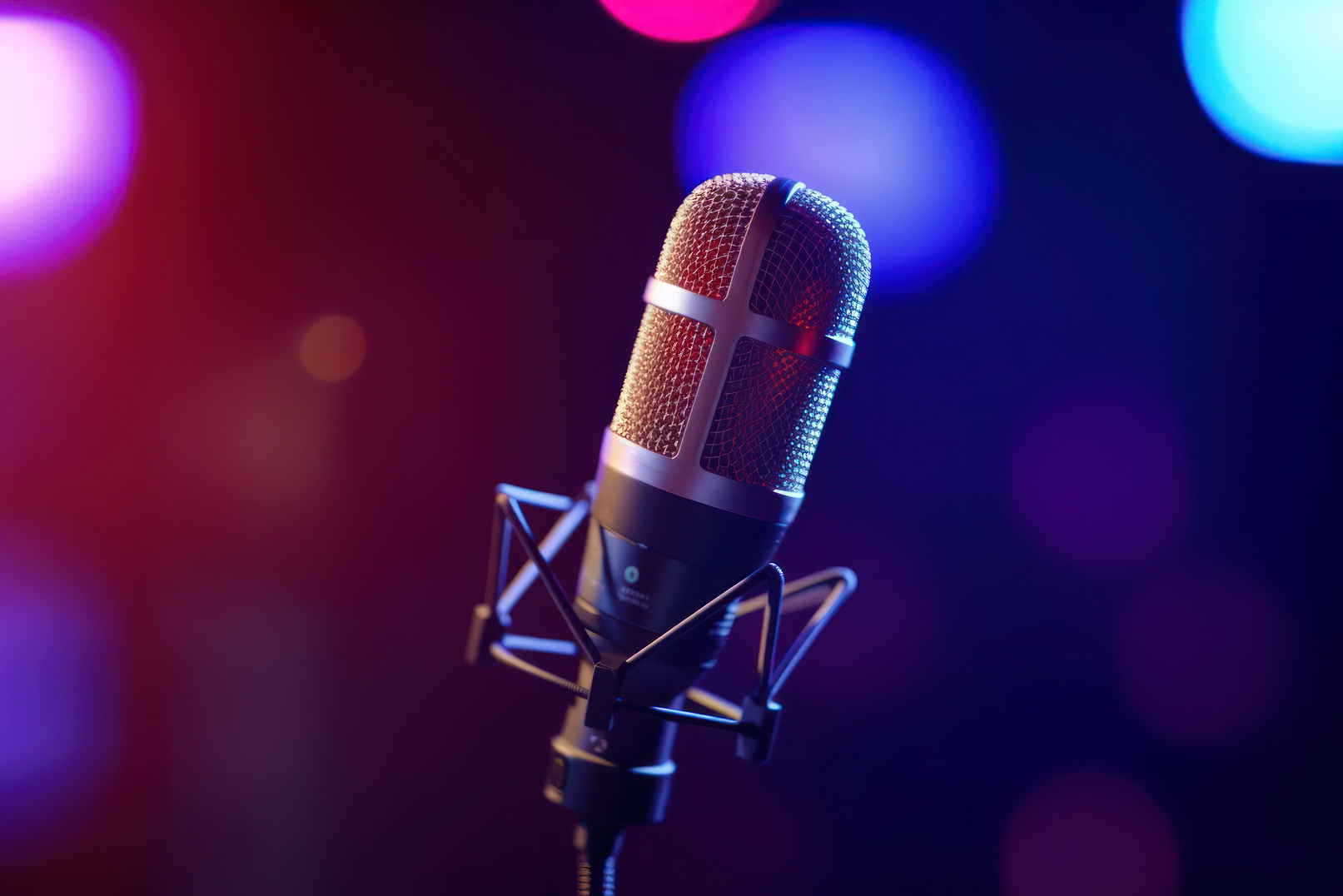 Studio Podcast Microphone on Blurry Neon Background
